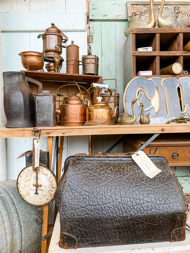 copper and black leather vendor goods