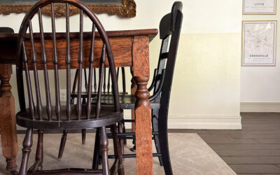 A beige vinyl FloorFlat in the dining room brightens up this space