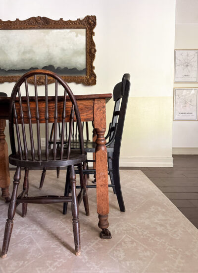 A beige vinyl FloorFlat in the dining room brightens up this space