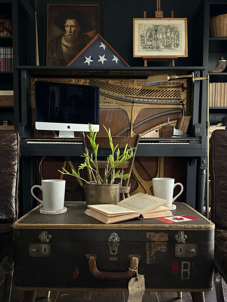 An office desk made out of a repurposed piano.